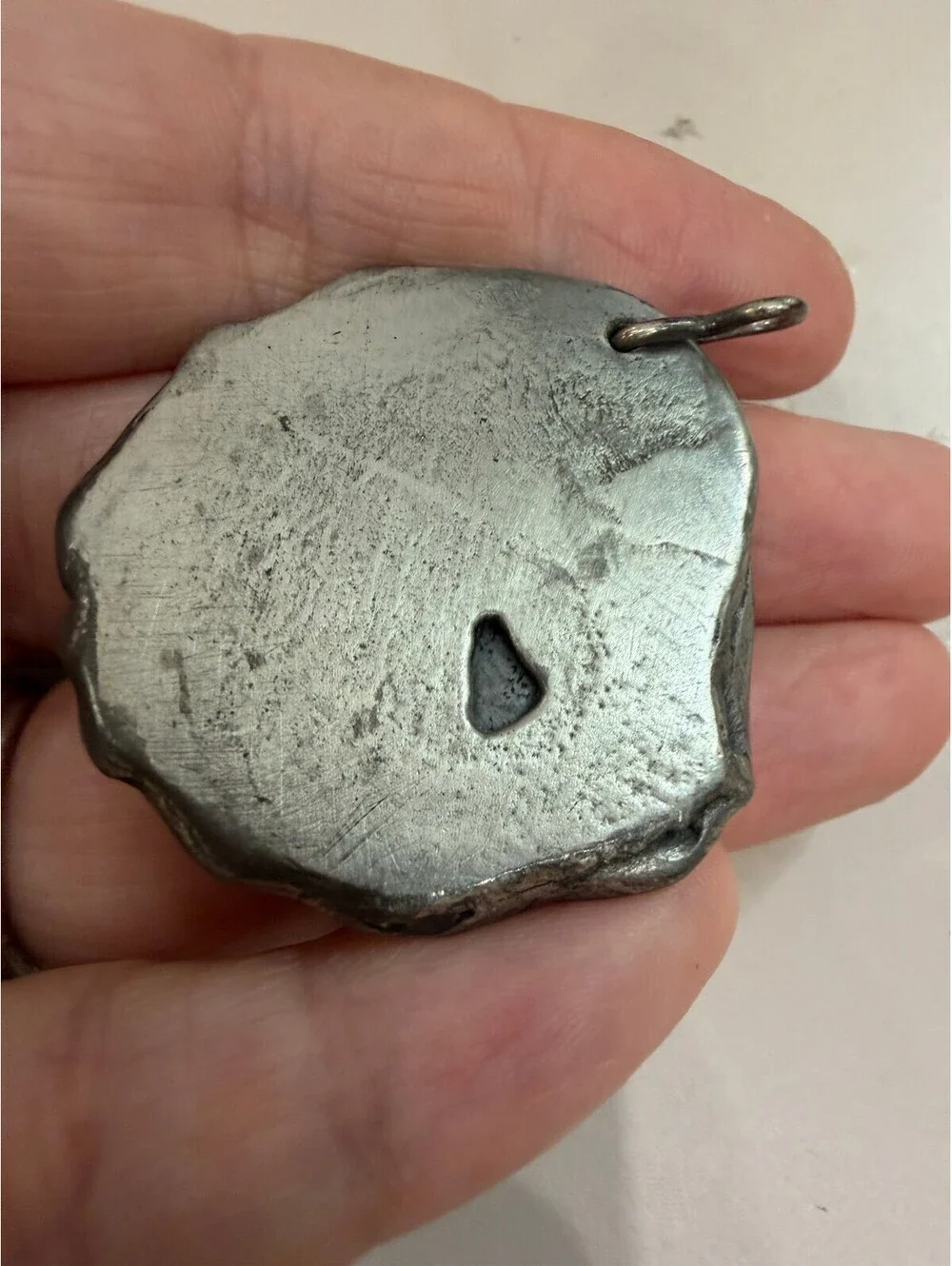 Handcrafted Silver Toned Pendant with Black Stone Center
